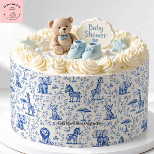 Baby blue safari animals French toile edible cake wrap 8x10 icing sheet applied to a white buttercream cake with jungle animal toppers for a boy baby shower