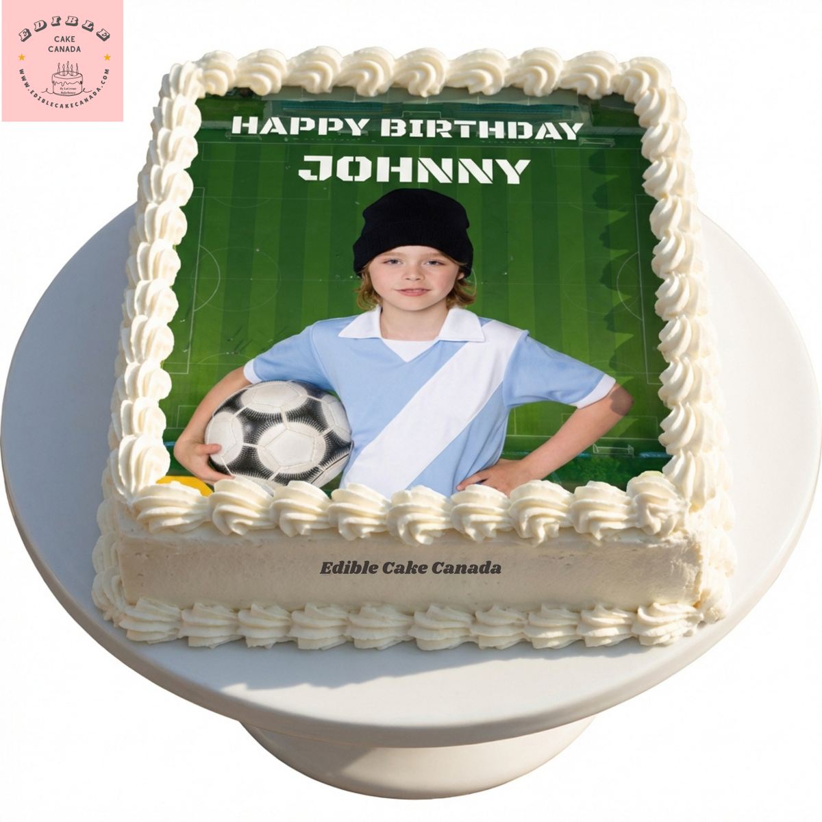 Custom edible icing cake topper with green soccer field background and Happy Birthday text on a birthday cake