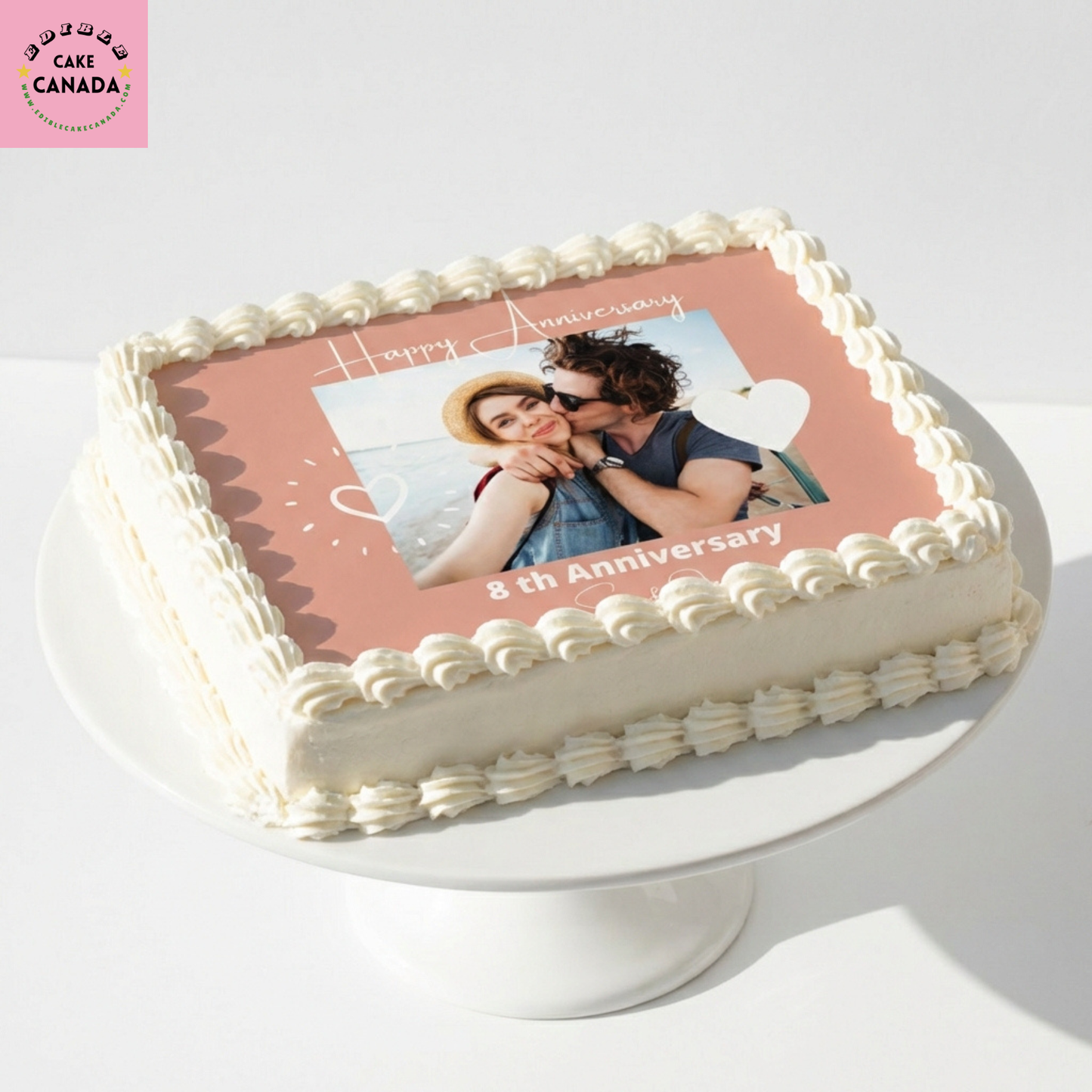 Personalized pink heart couple photo edible icing cake topper with custom text for anniversary and wedding cakes in Canada