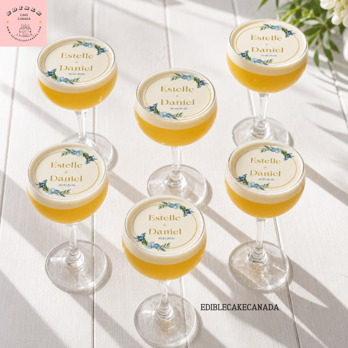 Custom edible wafer drink topper with floral wreath, monogram name and date — perfect for weddings and parties in Canada.